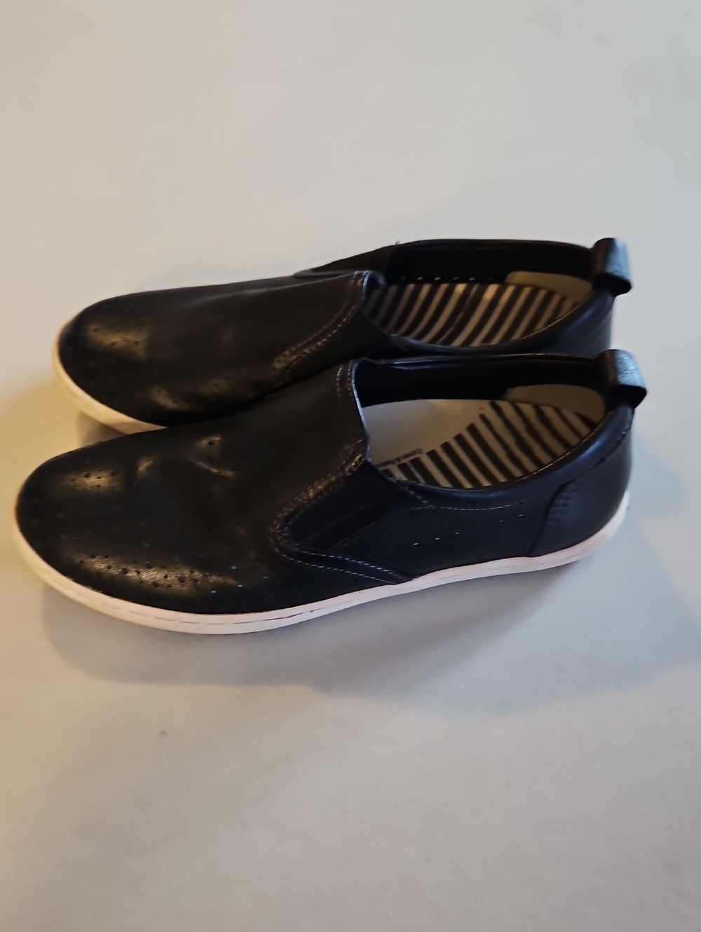 Taos Black Slip On Shoes